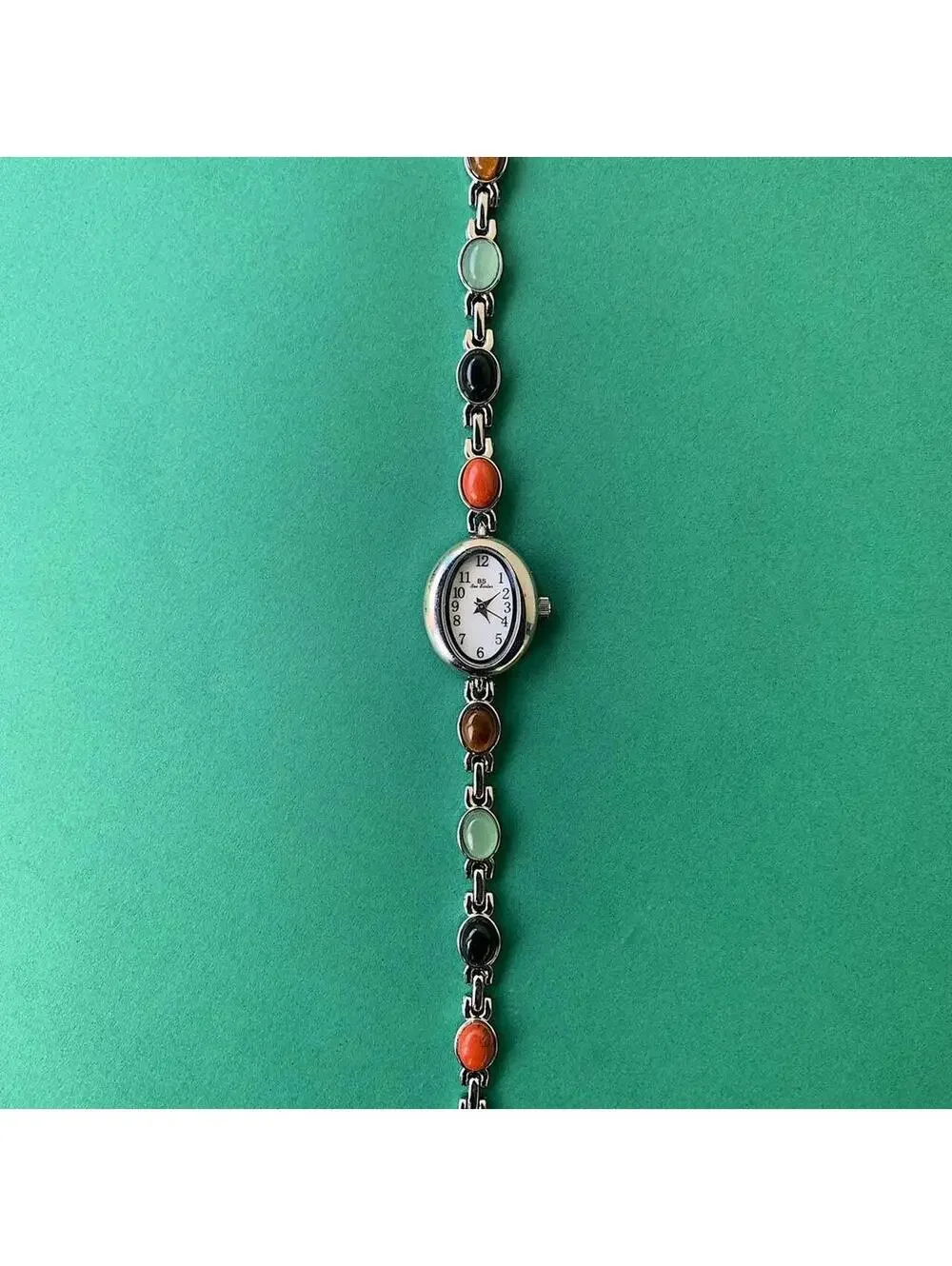 Y2k style silver tone quartz watch with glass multi color jade stone opal